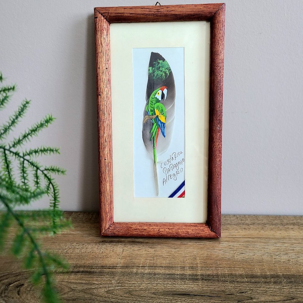 Parrot painting on feather.